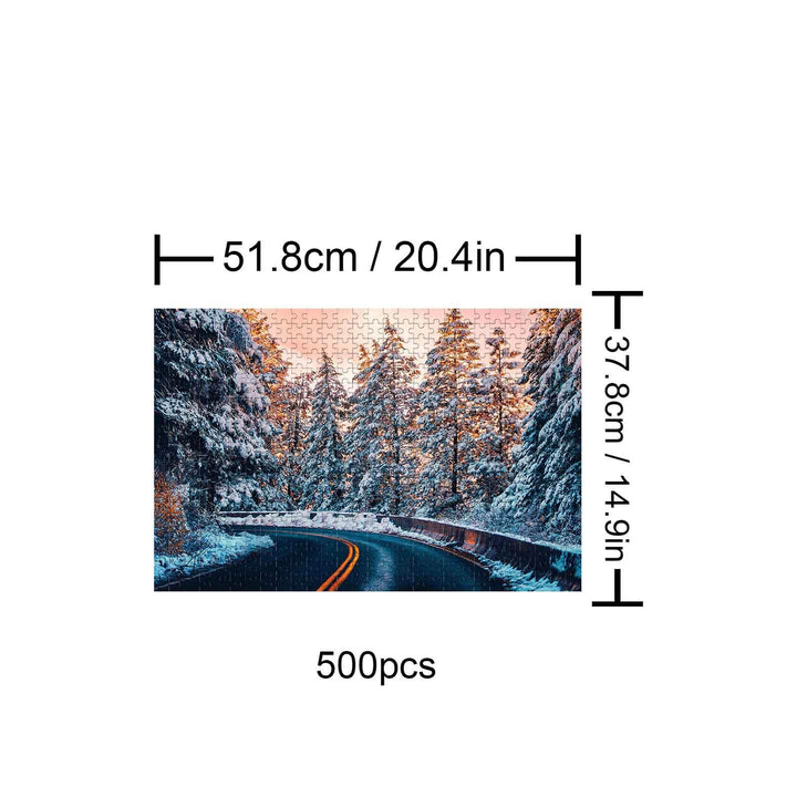 Snow Country Highway 500 Piece Puzzle featuring a scenic winter landscape with a winding road through snow-covered trees.