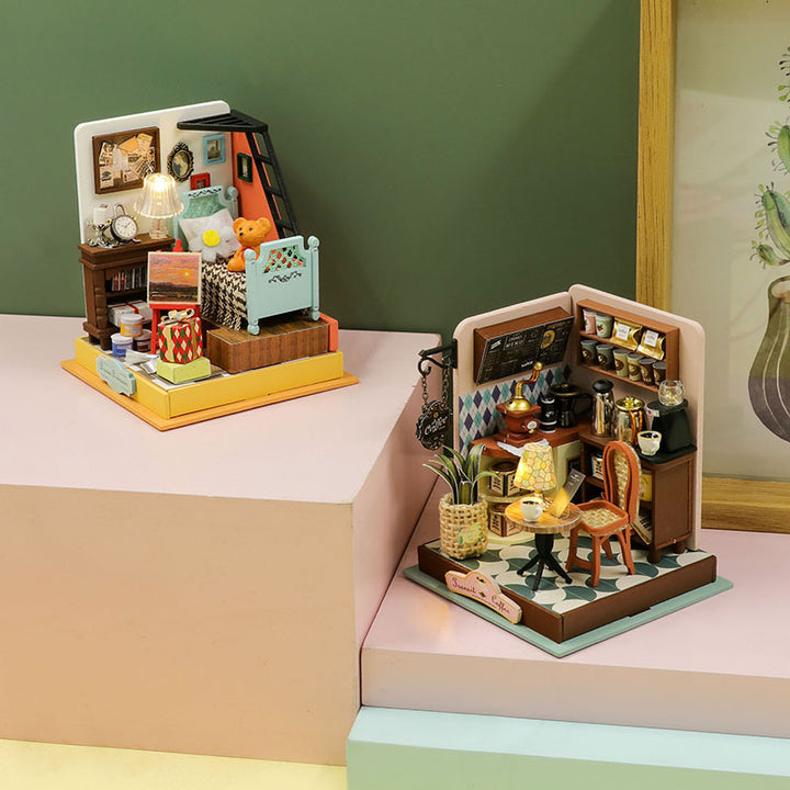 Mini house DIY dollhouse kit featuring a cozy kitchen and living room scene with detailed furniture and warm lighting.