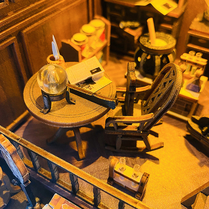 Detailed view of a wooden table with a lamp and chair in a cozy DIY book nook kit featuring musical elements.