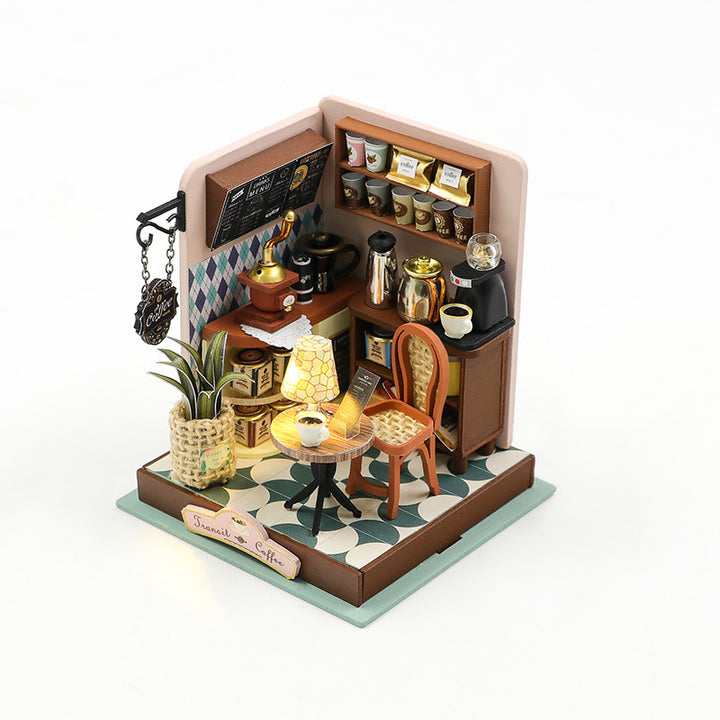 DIY miniature coffee shop dollhouse kit with detailed furnishings and decor, perfect for creative hobbies.