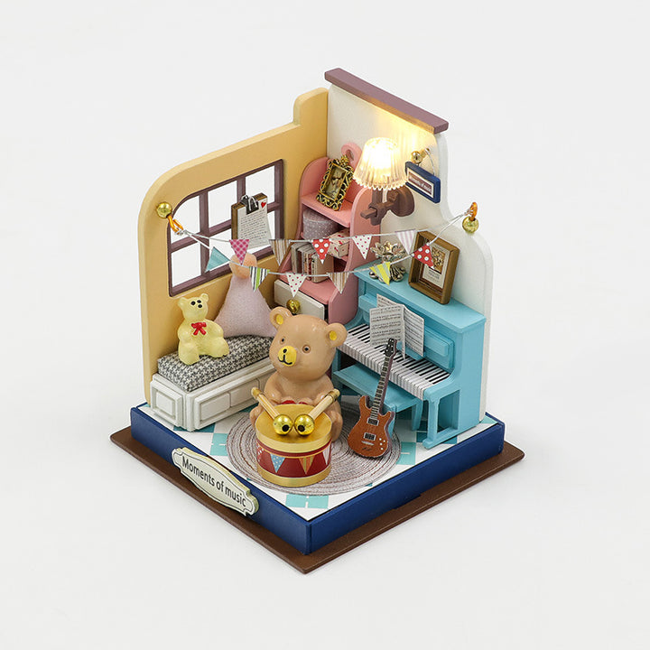 Mini house DIY dollhouse kit displaying a cozy room with toys, decor, and a light, perfect for creative enthusiasts.