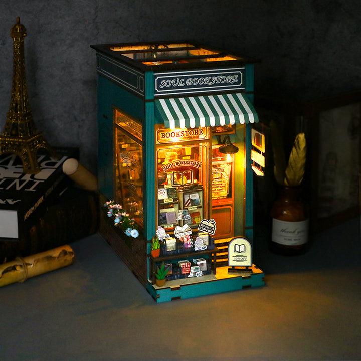 Soul Book Store DIY Book Nook Kit, a detailed wooden puzzle showcasing a lit European-style bookstore.