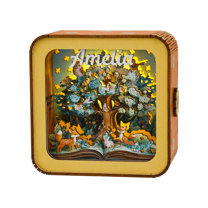 Personalized wooden night light featuring a 3D tree design with playful animals, perfect for home decor.