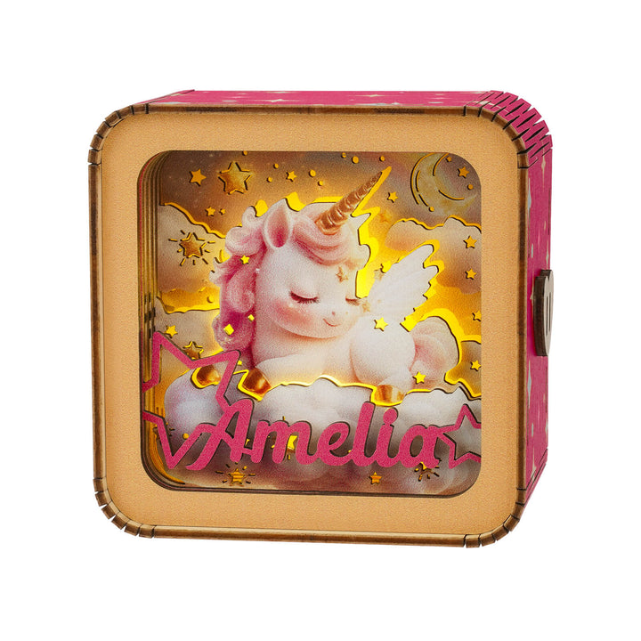 Personalized 3D wooden puzzle night light featuring a unicorn with the name Amelia, glowing softly against a starry background.