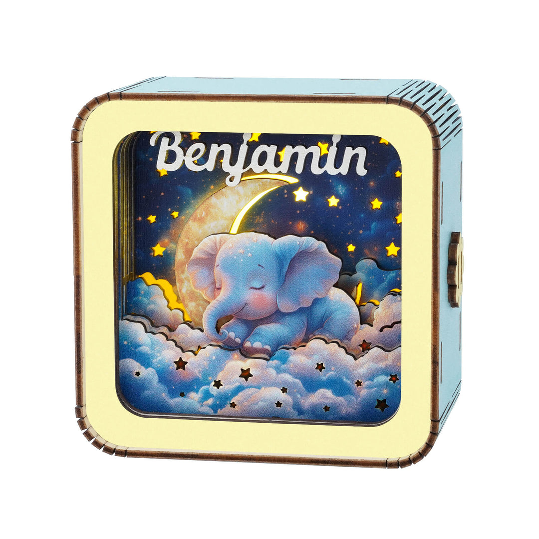 Personalized wooden night light featuring a sleeping elephant and the name Benjamin, perfect for children's decor.