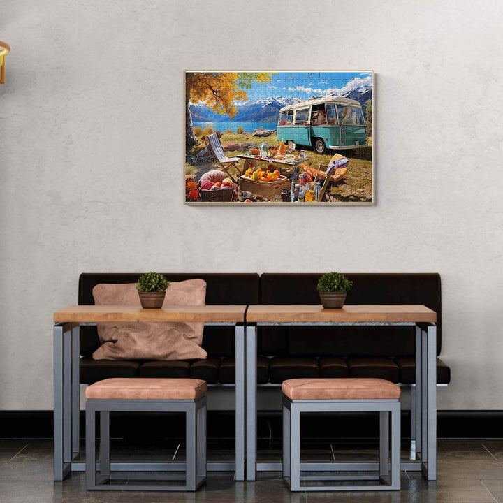 Cozy dining area with a wooden table and chairs, featuring a vibrant camping puzzle artwork.