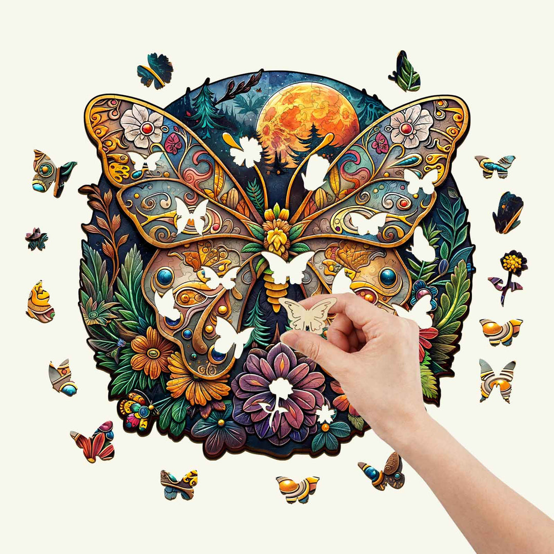 Vibrant Ancient Butterfly-1 wooden jigsaw puzzle with a hand placing a piece, showcasing colorful designs and floral elements.
