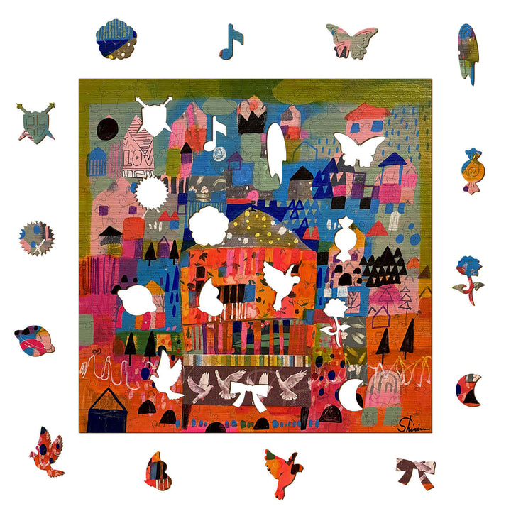Colorful artwork titled 'This Shall Pass' by Shirin Moarefi, featuring vibrant houses and whimsical shapes.