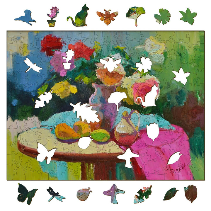 Colorful jigsaw puzzle featuring a floral still life by Alexander Shandor, with puzzle pieces around the artwork.