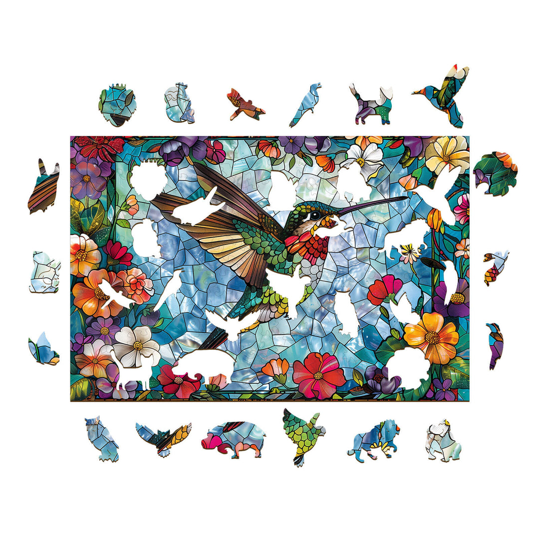 Stained Glass Hummingbird-4 wooden jigsaw puzzle with colorful pieces surrounded by floral designs.