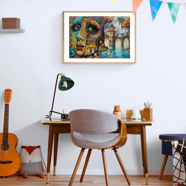 Artistic print displayed in a modern workspace with a guitar and desk lamp for a creative atmosphere.