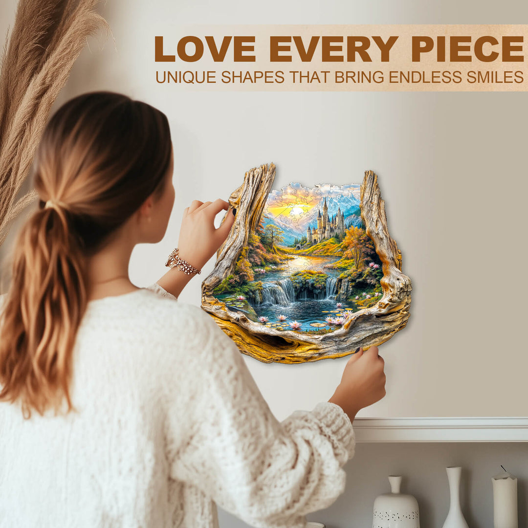 Woman assembling the Enchanted Frame-2 wooden jigsaw puzzle with a scenic landscape, showcasing unique shapes and mindful engagement.