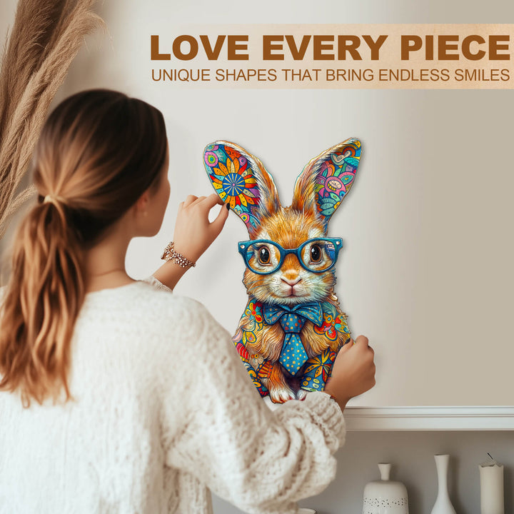 Person assembling a colorful bunny-shaped wooden jigsaw puzzle, showcasing unique shapes and vibrant designs.