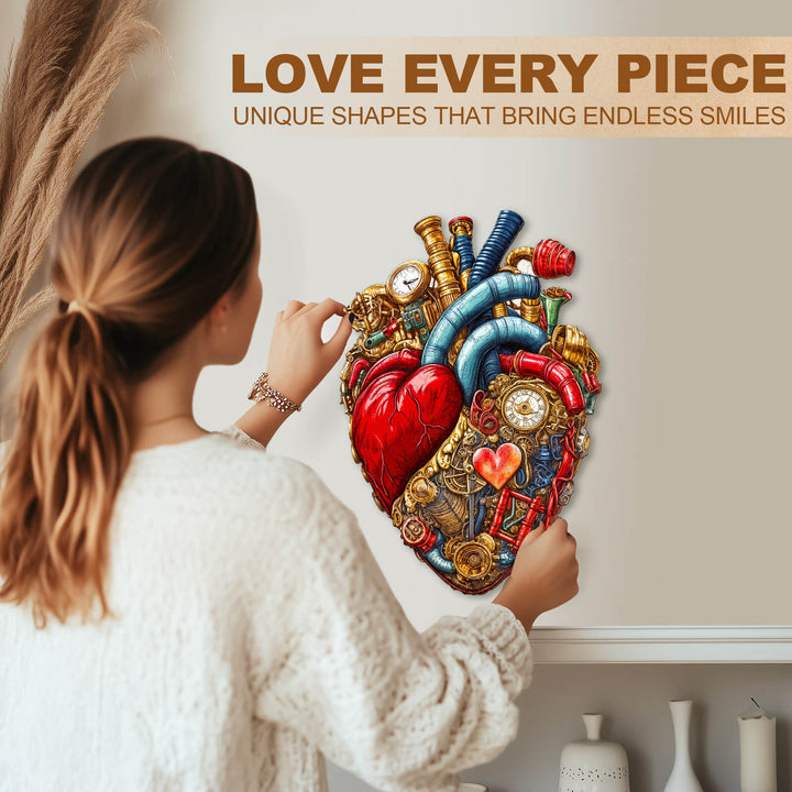 Person assembling the Mechanical Heart-2 wooden jigsaw puzzle with vibrant, unique shapes for mind games.
