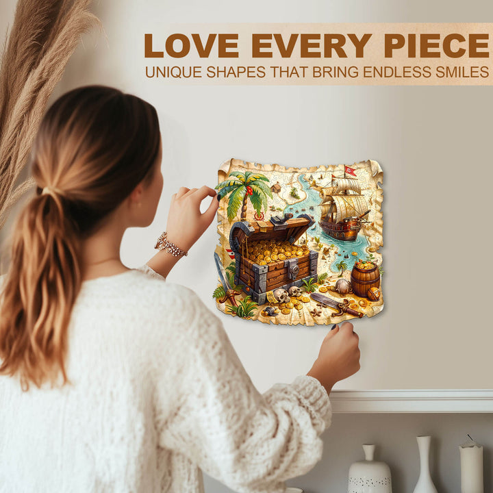Person assembling a Treasure Voyage wooden jigsaw puzzle with unique shapes, showcasing a treasure chest and ship.