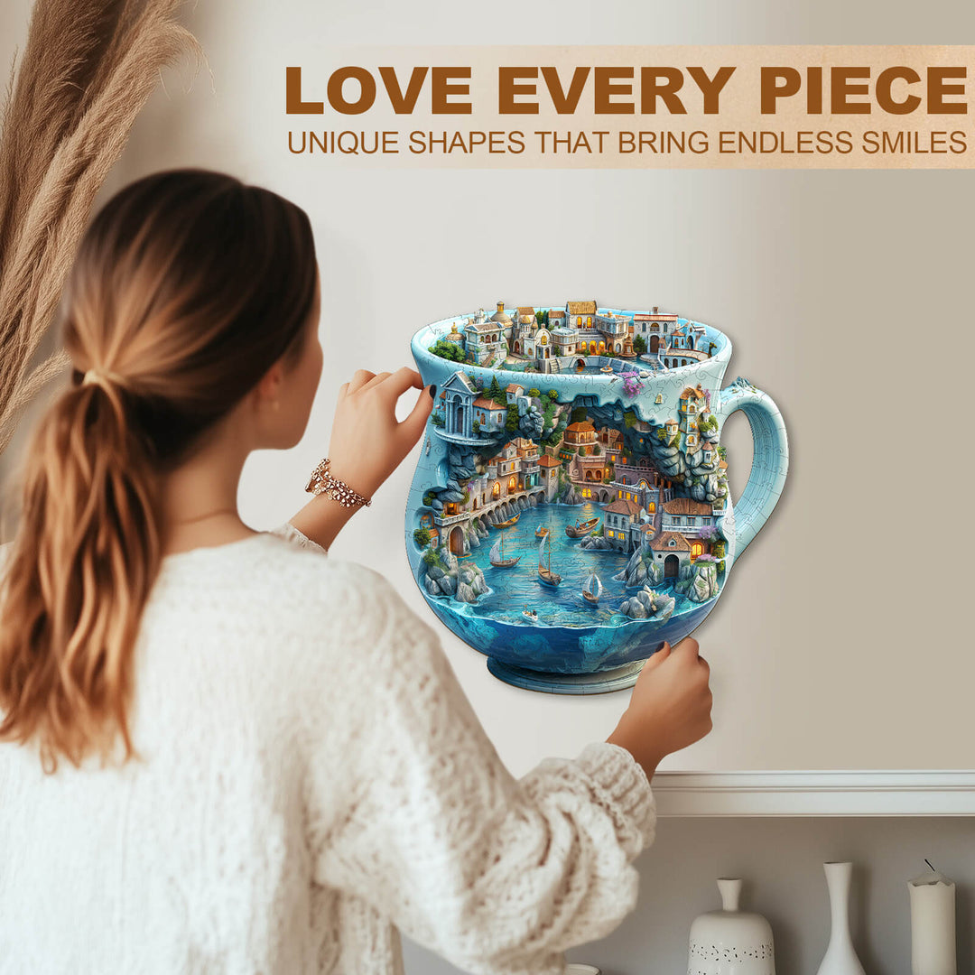 Woman admiring a seaside town wooden jigsaw puzzle, showcasing unique shapes and vibrant colors, perfect for puzzle lovers.