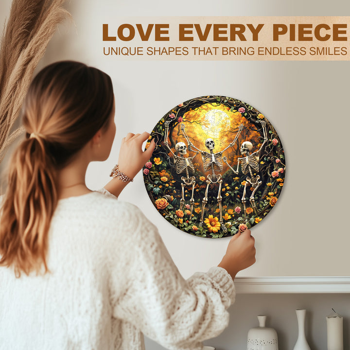 Person assembling the Skeleton Moon Glee wooden jigsaw puzzle with vibrant colors and unique shapes for endless fun.