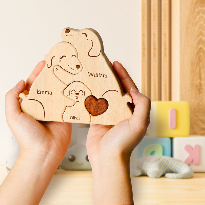 Personalized wooden dog family puzzle featuring intricate carvings of names, a thoughtful family gift.