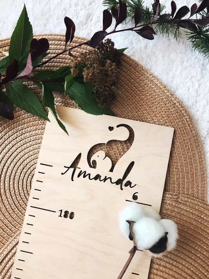 Personalized wooden height ruler with engraved animal design and name 'Amanda', perfect for children's growth tracking.