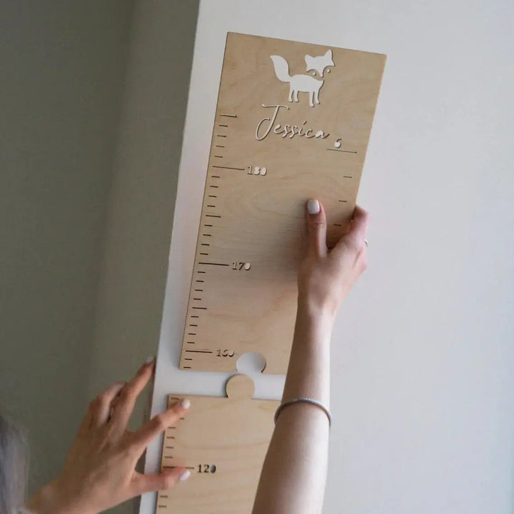 Personalized wooden height ruler with fox design and engraved name, perfect for tracking children's growth in a stylish way.