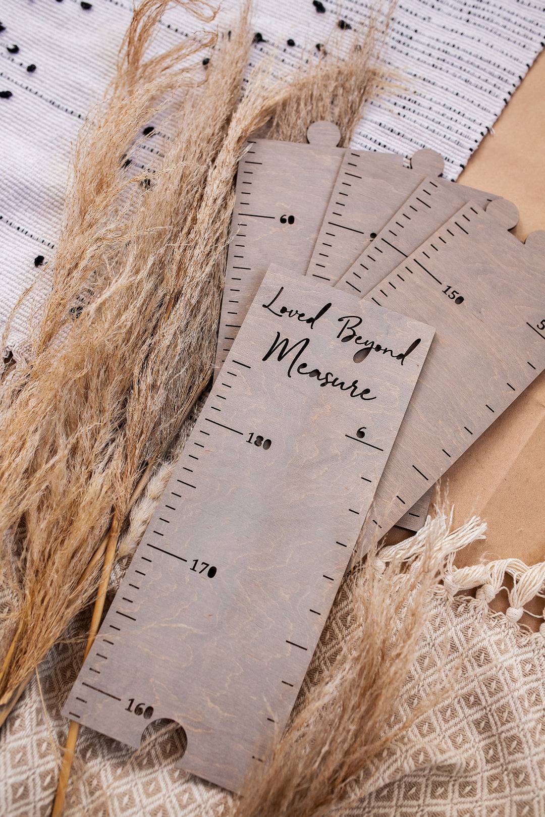 Personalized wooden growth chart for kids' room decor with measurement scale and elegant design.