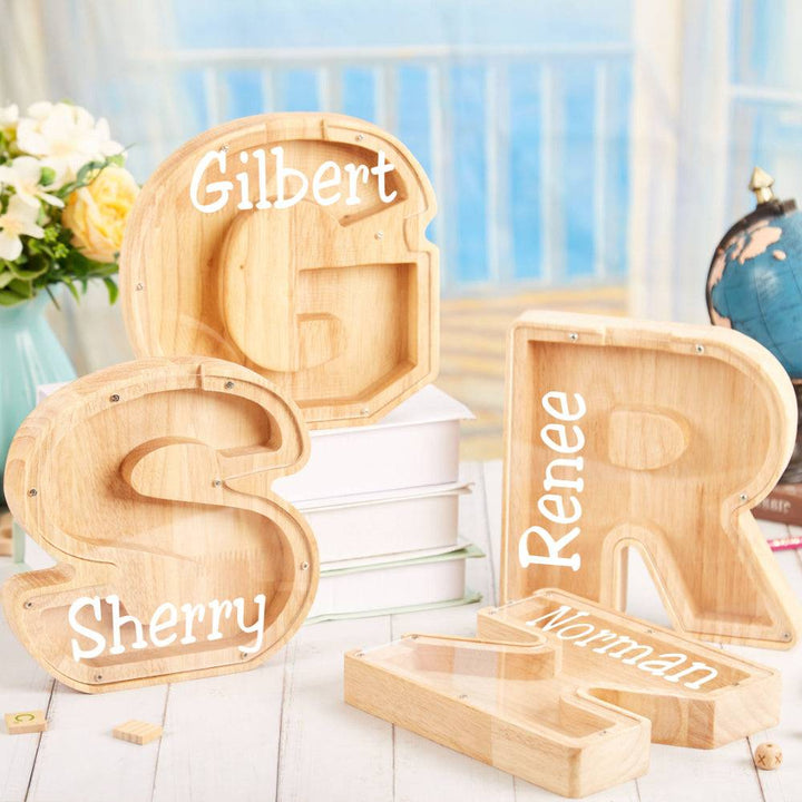 Personalized wooden letters for kids, showcasing names like Gilbert, Sherry, and Renee in a playful arrangement.
