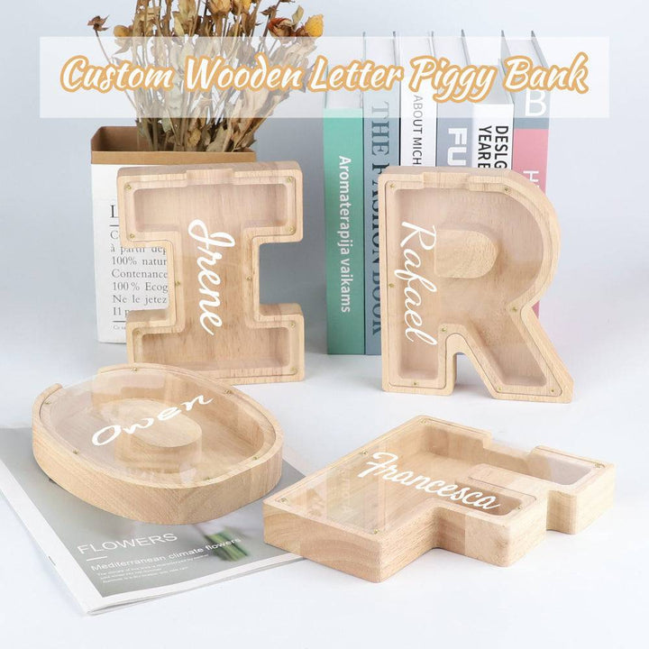 Personalized wooden letter piggy banks for kids, featuring custom names and a coin slot for savings.