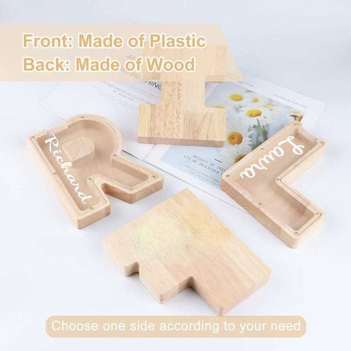 Personalized letter piggy bank made of wood and plastic, displaying options with names Richard and Samuel.