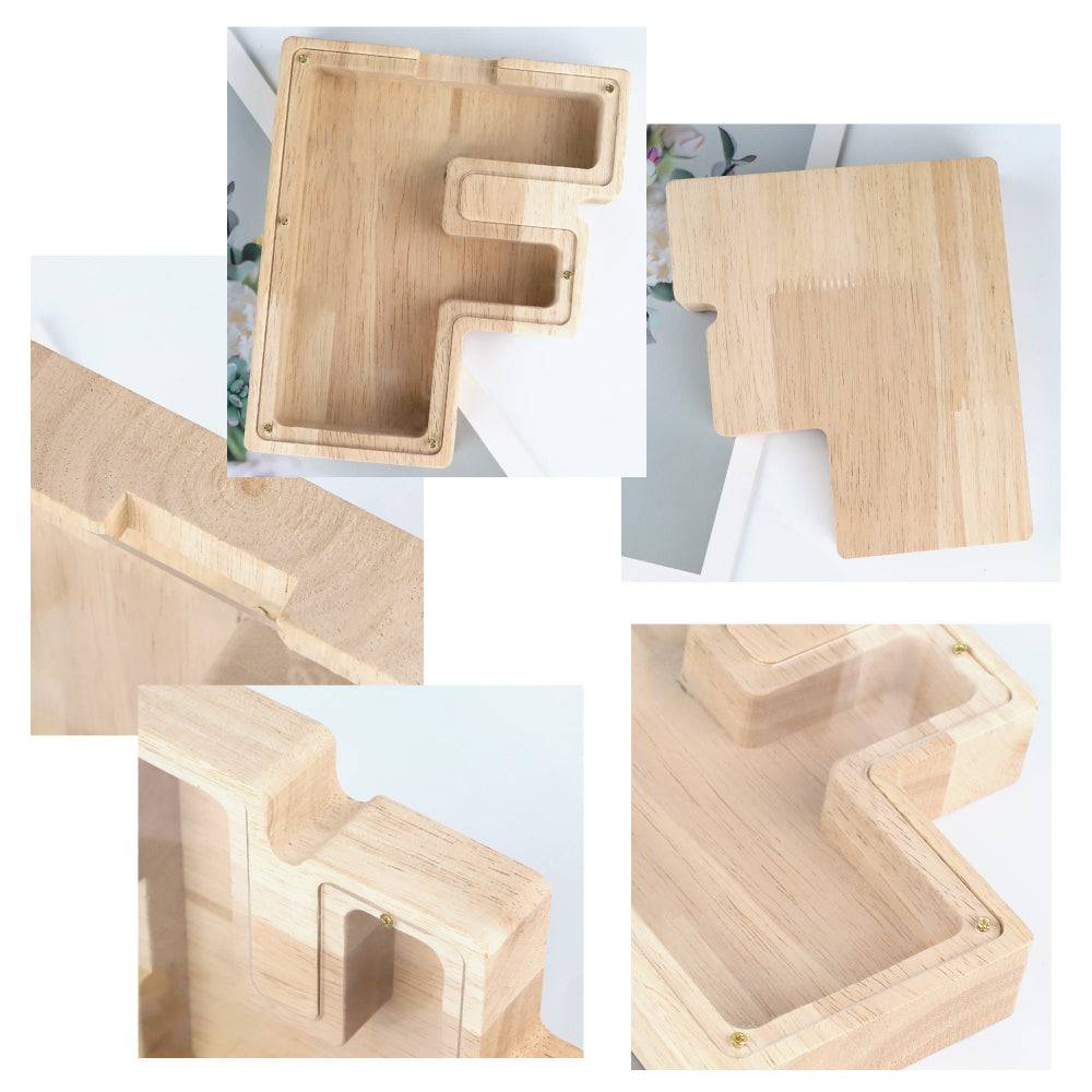 Close-up of personalized wooden letter piggy bank showing interior and acrylic features, perfect gift for kids.