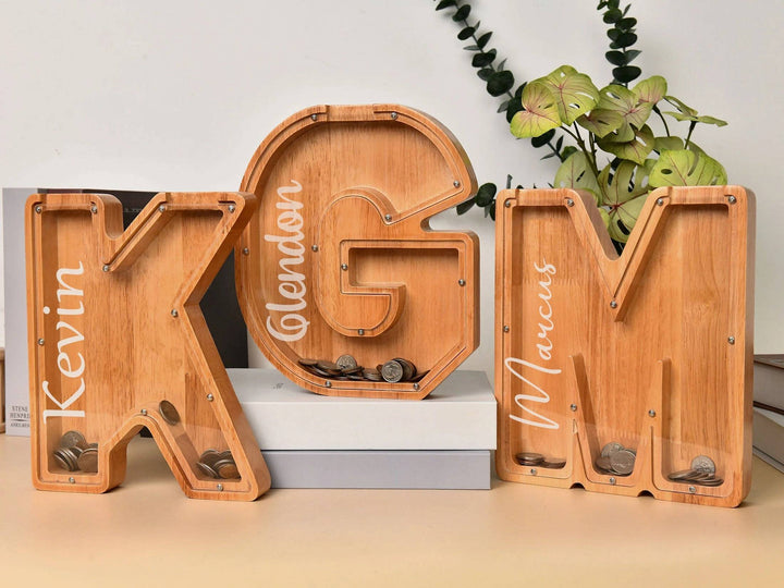 Custom wooden letter piggy banks personalized for kids, promoting financial awareness and savings.