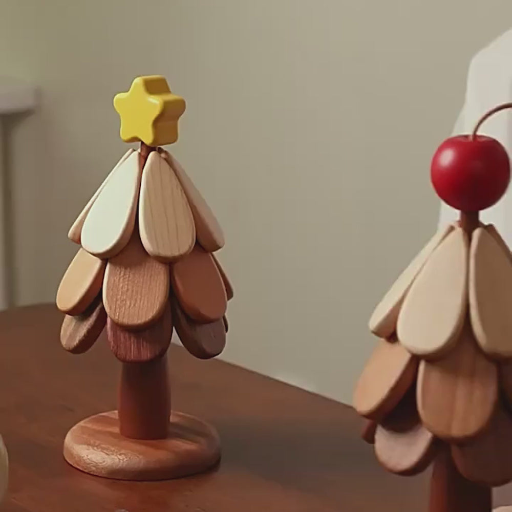 Wooden Christmas tree decor with natural wood texture and colorful star topper, adding festive charm to home decor.