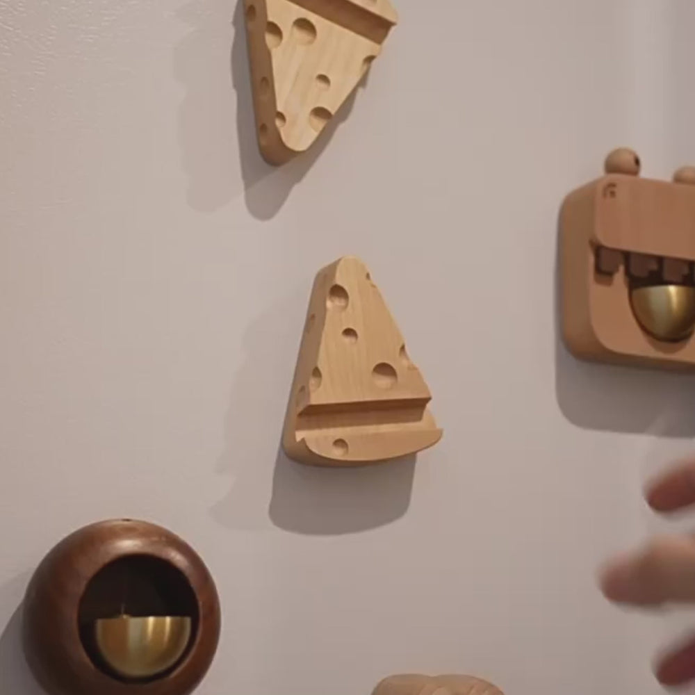 Natural maple wood cheese-shaped bottle openers with magnetic suction for kitchen decor and fun.