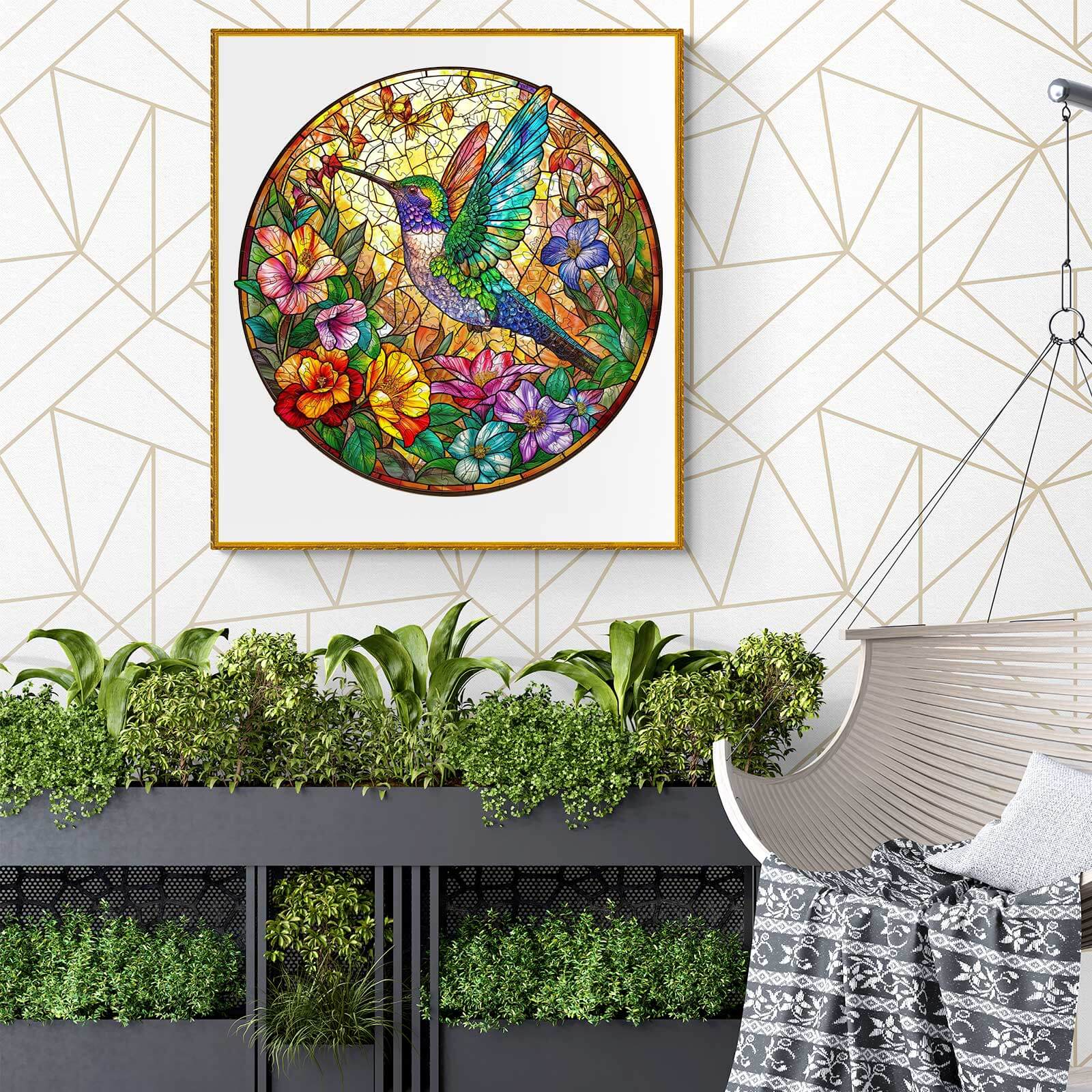 Stained glass hummingbird artwork in a modern decor setting with vibrant flowers and greenery.