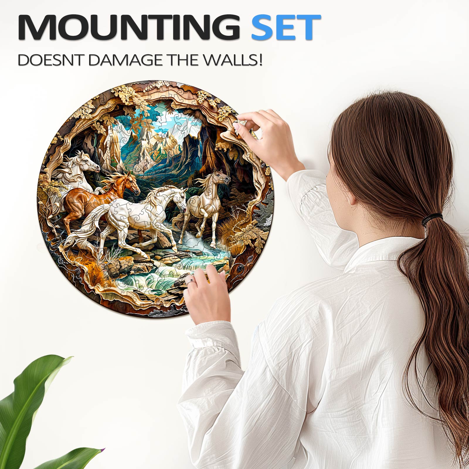 Person using a mounting set to hang a 3D horse wooden jigsaw puzzle on the wall without damage.