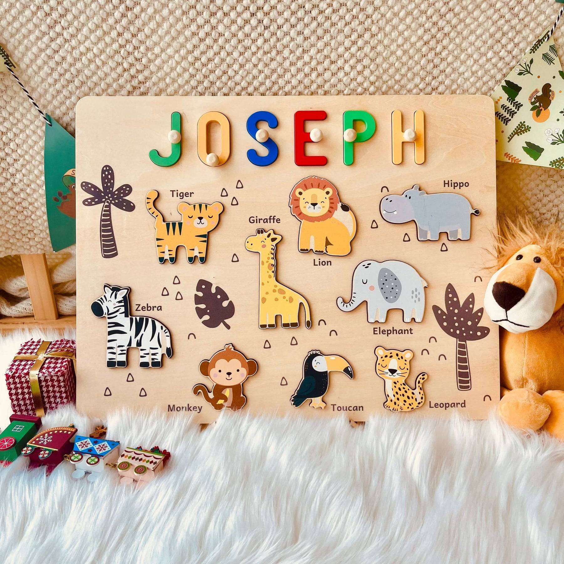 Personalized jungle animal name puzzle featuring colorful letters and cute animal figures, perfect for kids.