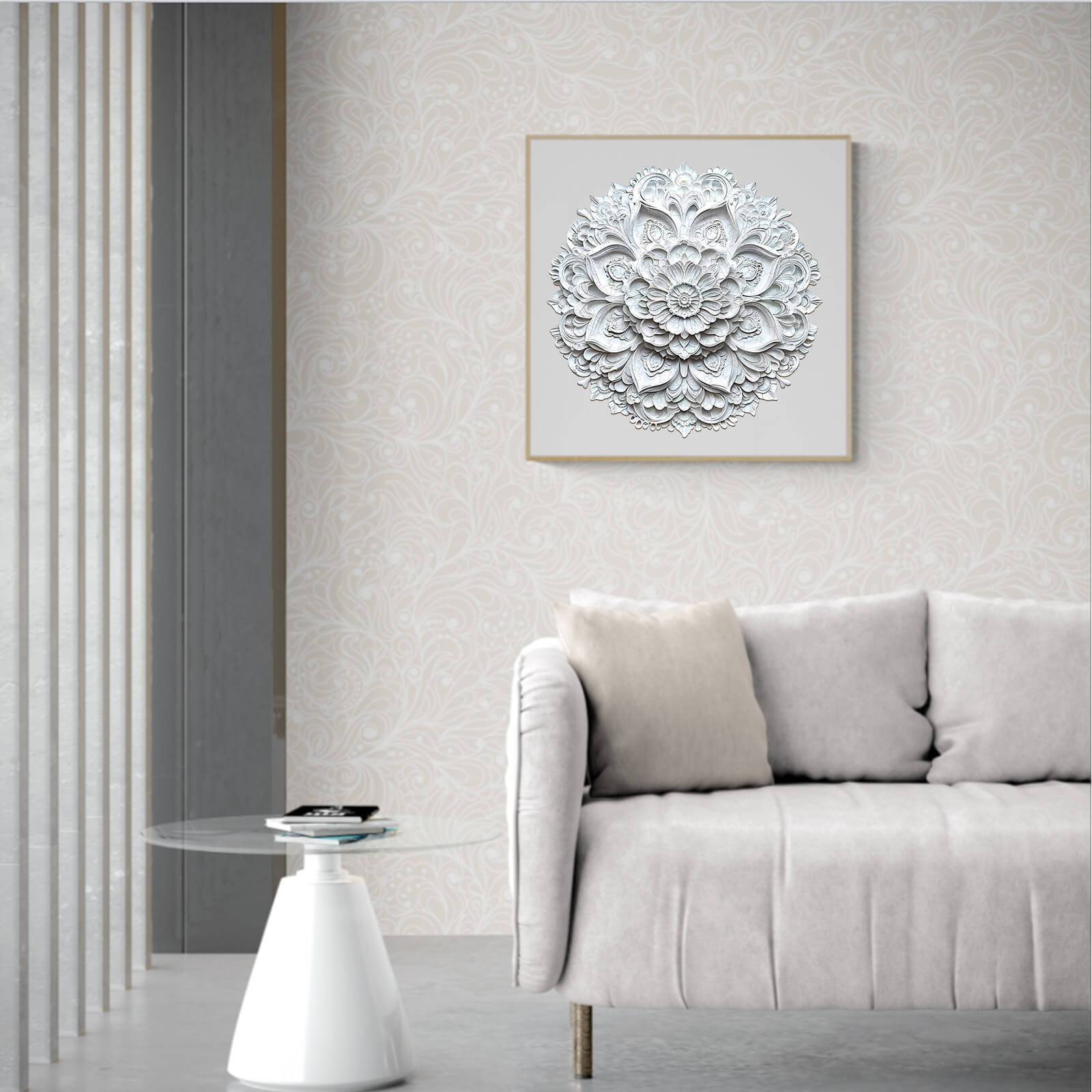 Elegant white 3D paper mandala art piece displayed on a neutral wall above a cozy gray sofa in a modern living room.