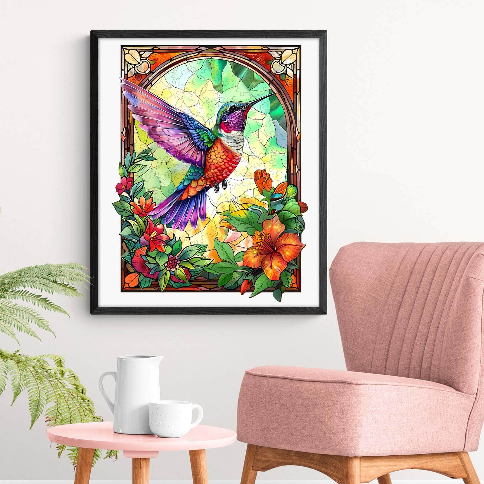 Colorful stained glass illustration of a hummingbird surrounded by vibrant flowers in a cozy living space.