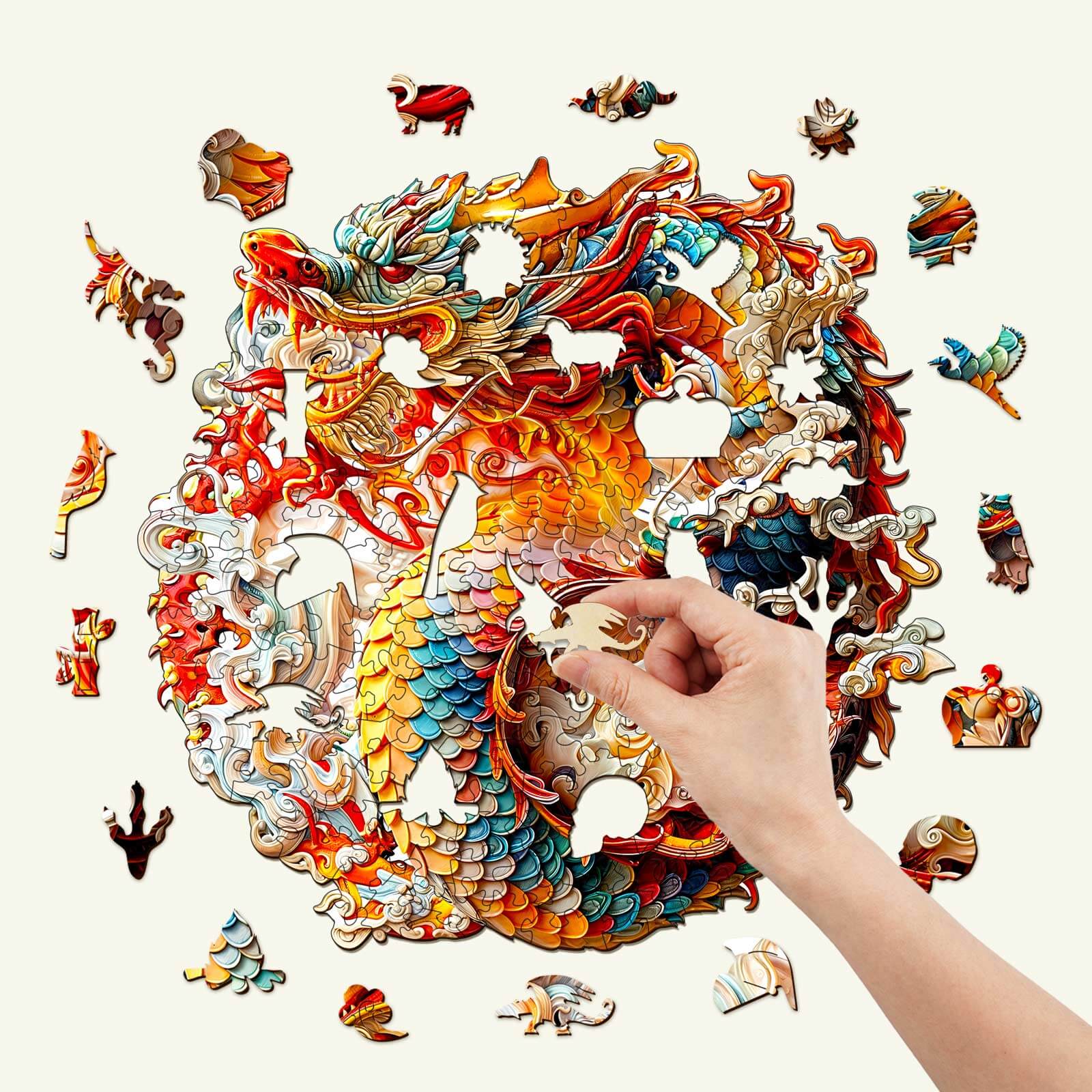 A hand placing a piece in a colorful 3D Chinese Dragon wooden jigsaw puzzle surrounded by finished pieces.