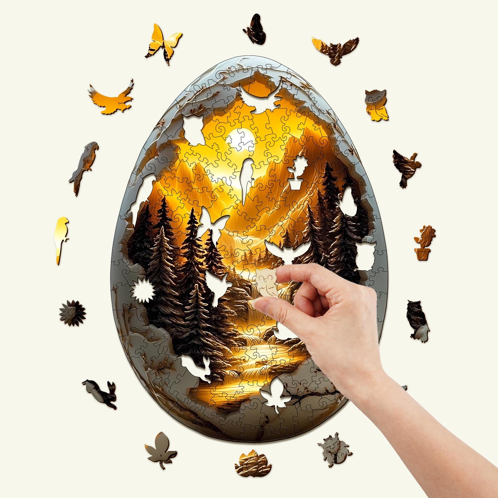 Person assembling a beautiful 3D Eggshell World-1 wooden jigsaw puzzle with scenic forest and butterfly pieces.