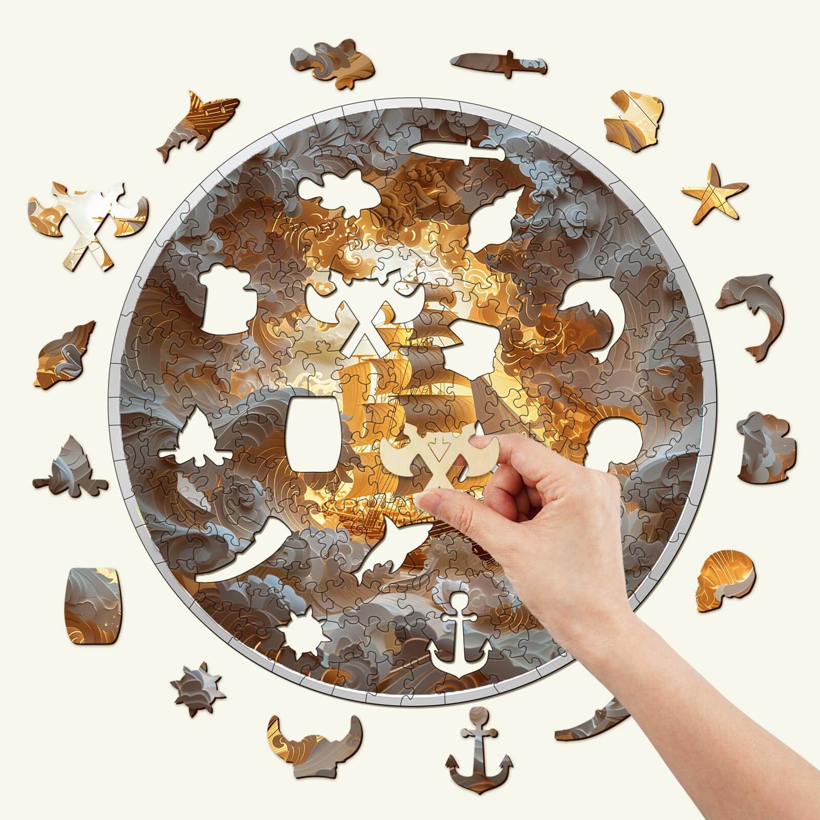 Hand placing a piece into the 3D Sailing-2 wooden jigsaw puzzle with marine-themed pieces surrounding it.