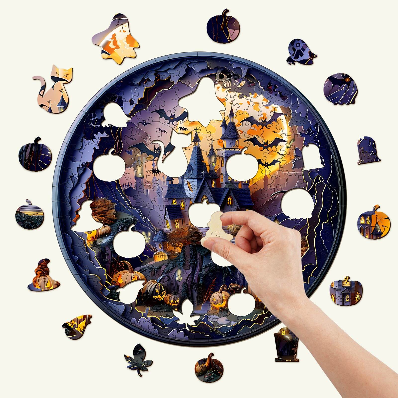3D Halloween Castle-2 wooden jigsaw puzzle with colorful pieces and a hand assembling it, perfect for Halloween decor.