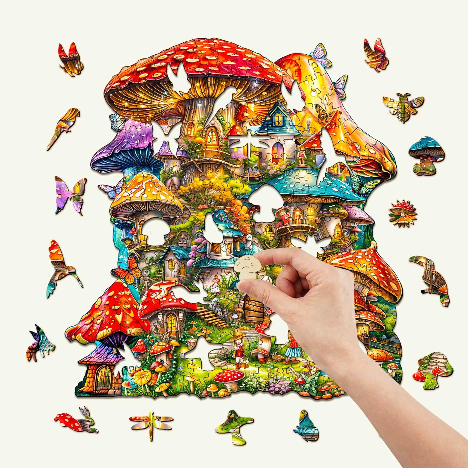 A hand placing a piece in a colorful Mushroom House wooden jigsaw puzzle, showcasing vibrant fungi and whimsical designs.