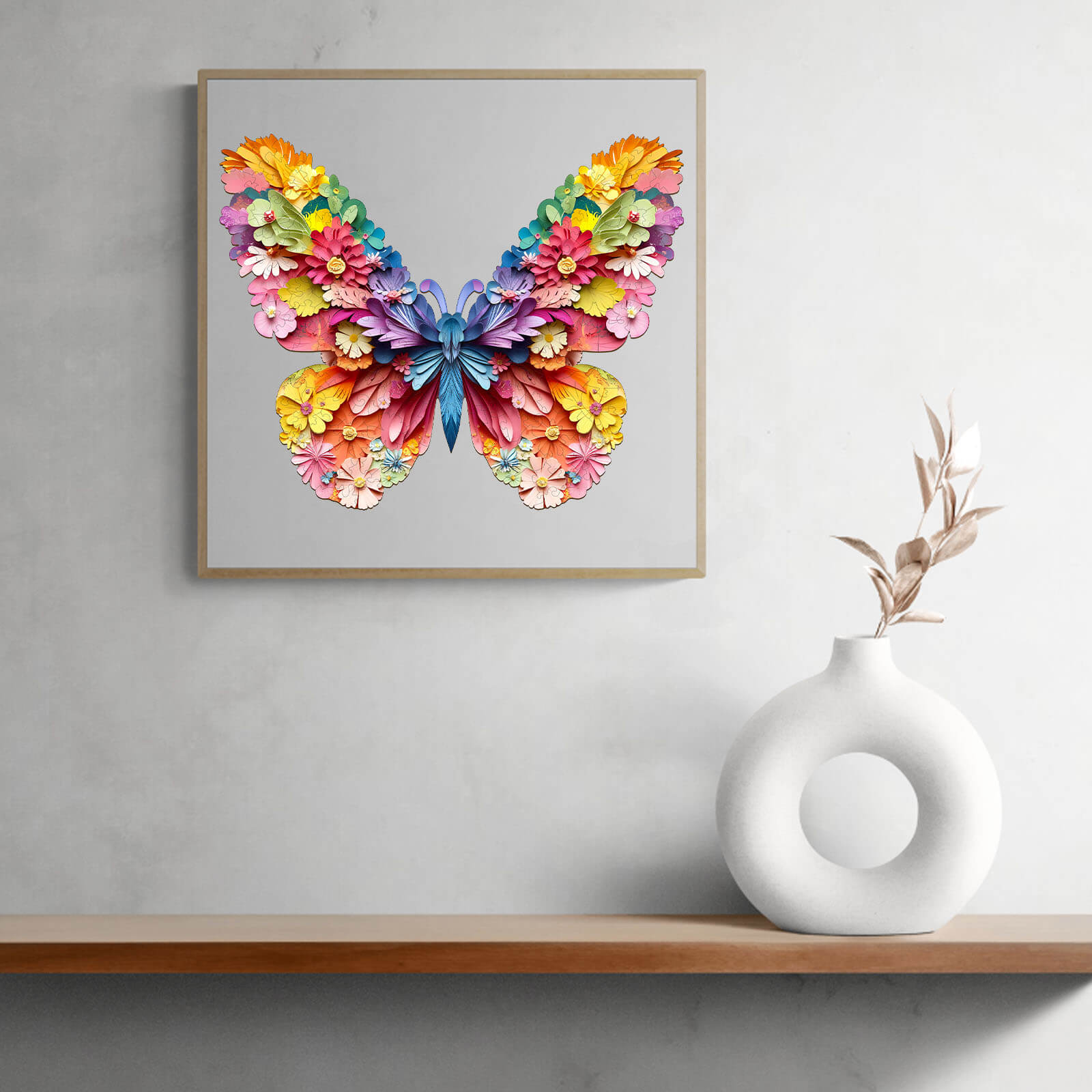 Colorful butterfly artwork displayed on a wall, showcasing vibrant flowers and intricate design.