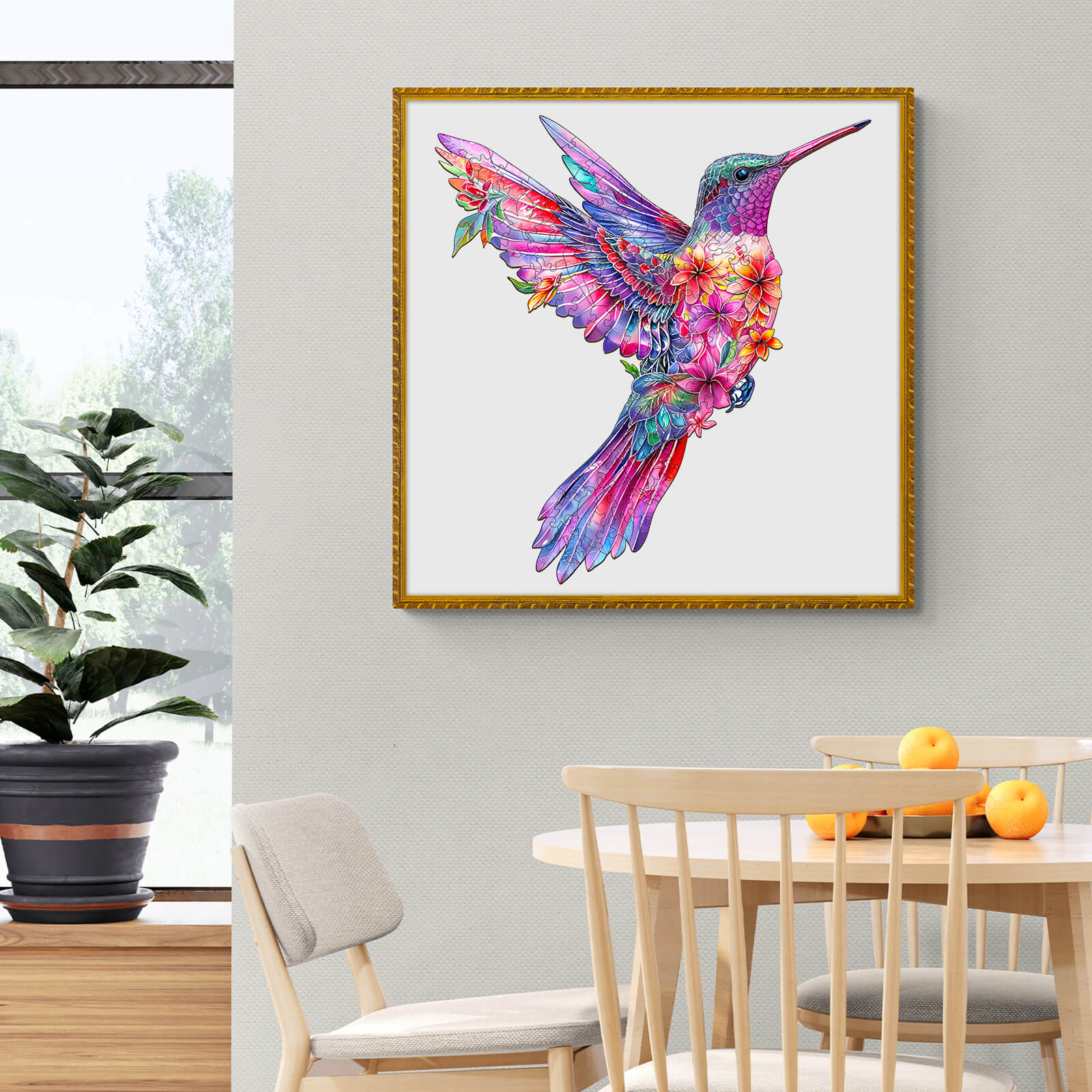 Colorful hummingbird artwork framed on a wall, enhancing the aesthetic of a modern dining space.