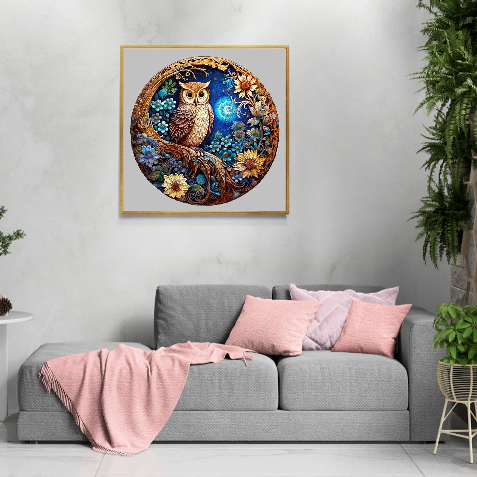 Moonlight Owl wooden jigsaw puzzle art displayed above a cozy couch in a stylish living room.