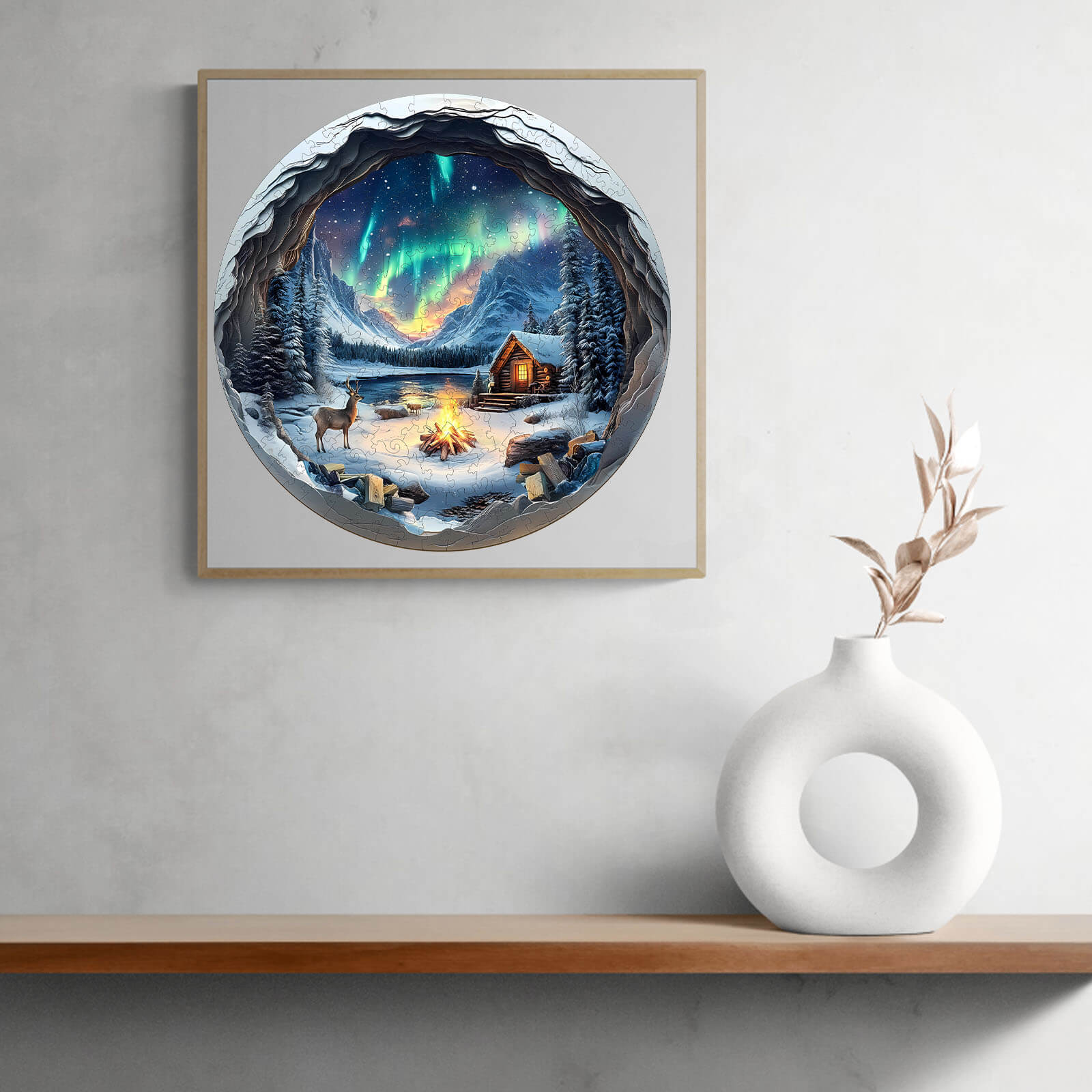 3D wooden jigsaw puzzle depicting a cozy cabin under the Northern Lights, surrounded by deer and a campfire.