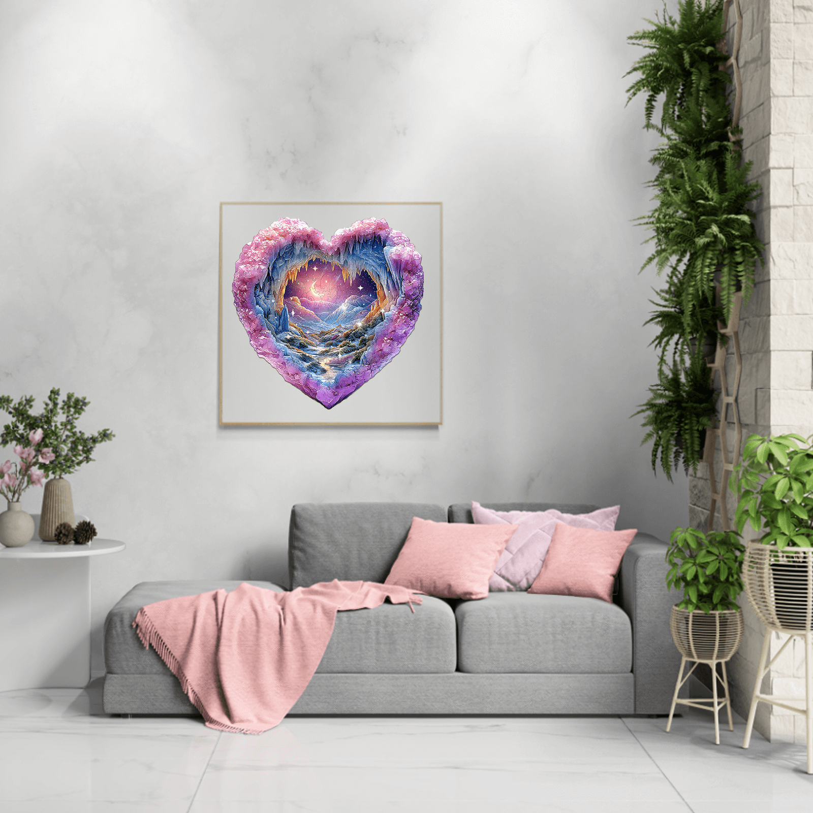 Heart-shaped cosmic art in a modern living room with gray sofa and pink cushions, adding a romantic touch to home decor.