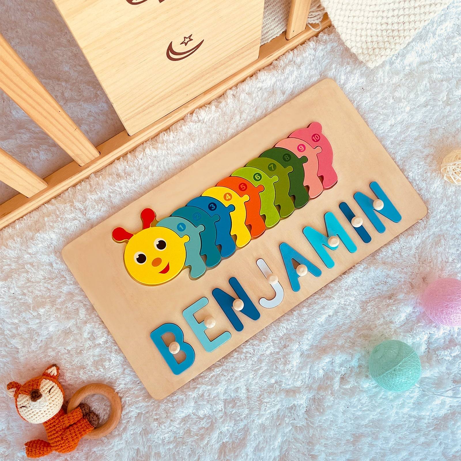 Personalized wooden name puzzle for toddlers with colorful letters and caterpillar design. Eco-friendly and non-toxic.