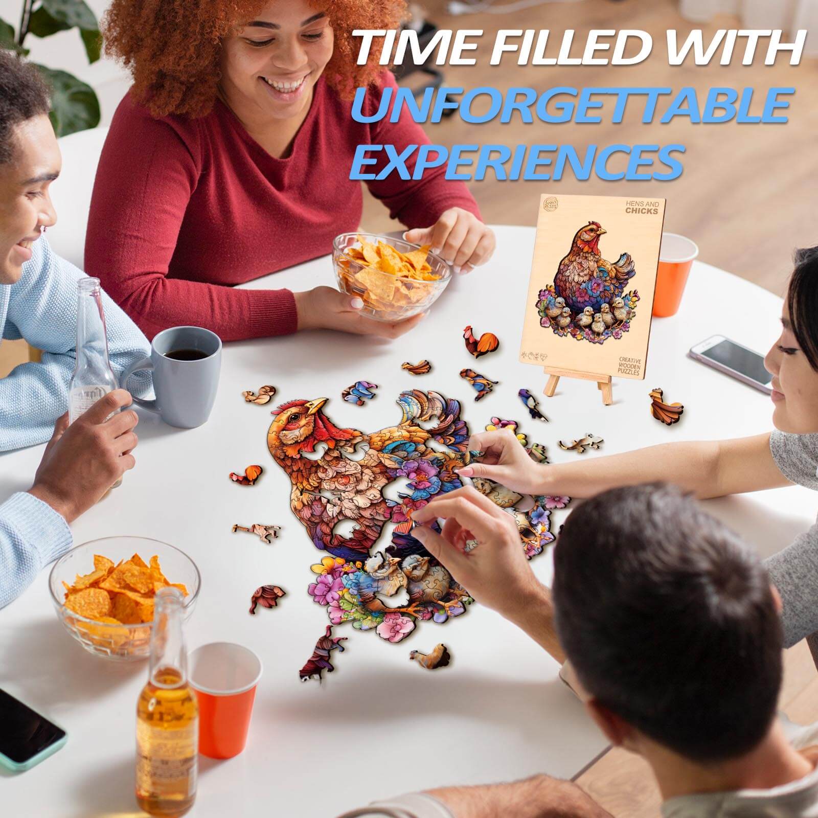 Group of friends assembling a colorful Hens and Chicks wooden jigsaw puzzle, sharing snacks and laughter.