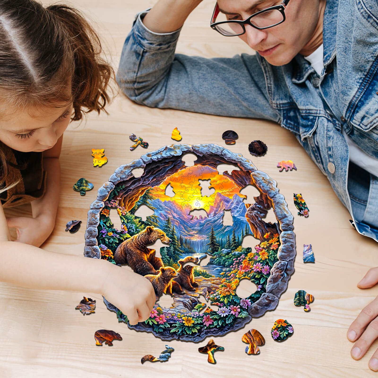 A child and adult assembling the 3D Bear's Journey wooden jigsaw puzzle, featuring vibrant wildlife and a scenic landscape.